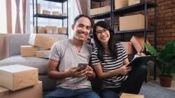 AANHPI couple entrepreneurs small business packing boxes